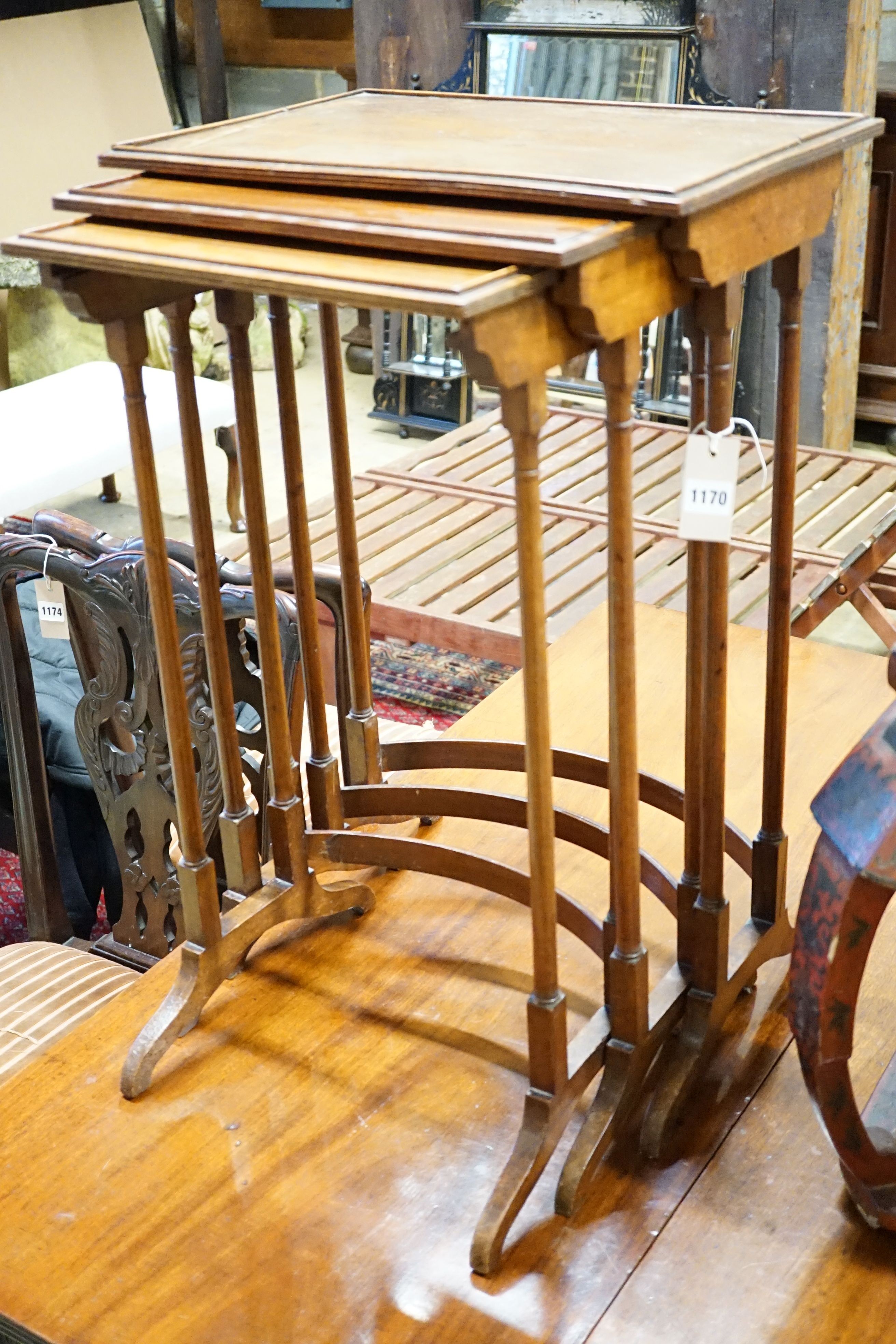 An Edwardian nest of three mahogany occasional tables, width 48cm